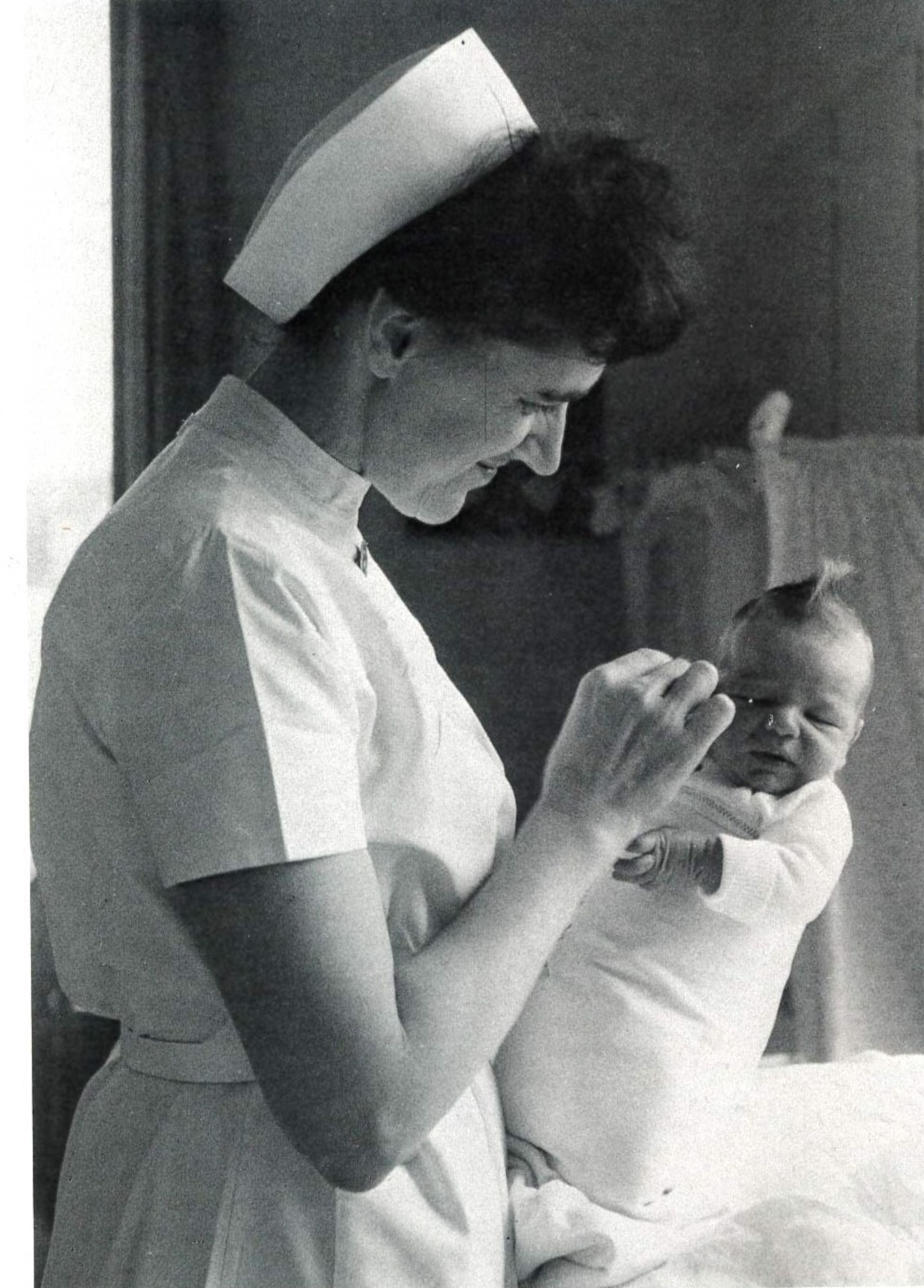 Hebamme mit Säugling